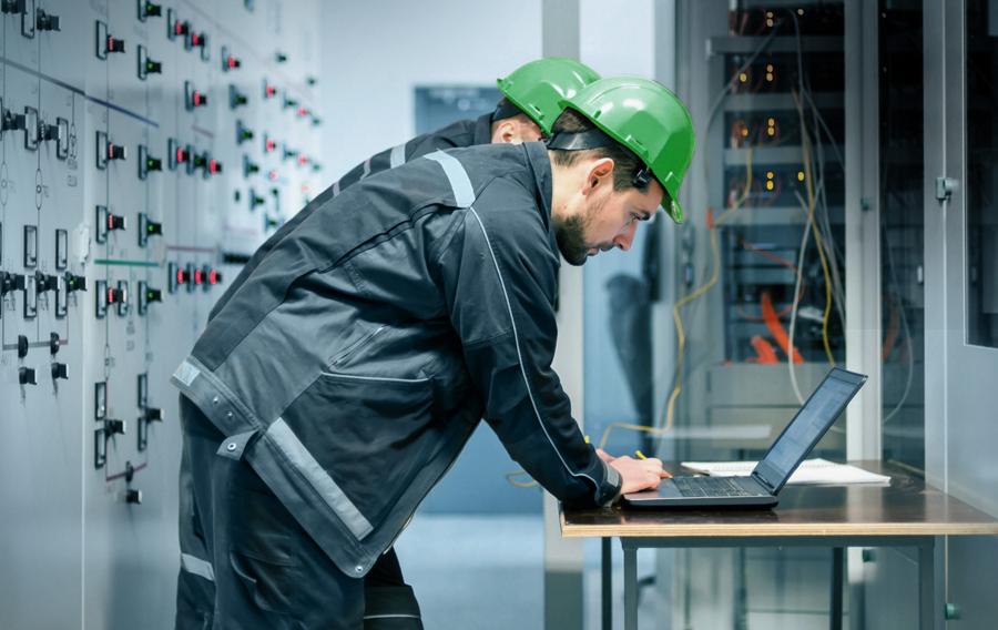 Sunbelt Rentals workers managing their equipment online. 