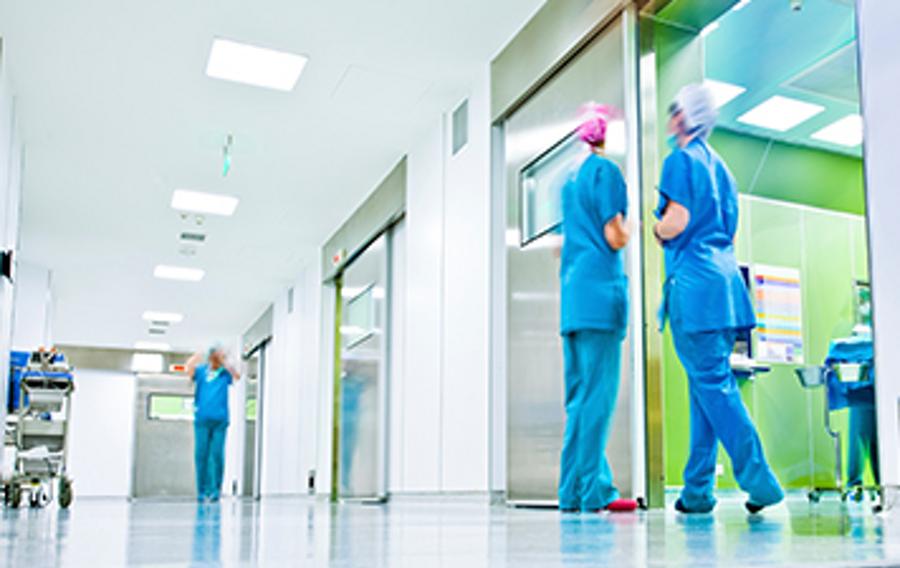 People in the hallway of a hospital.