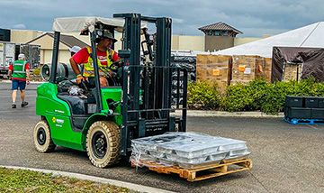 Sunbelt Rentals Forklift operating in a warehouse