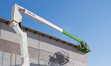 Sunbelt Rentals worker operating Aerial Lift