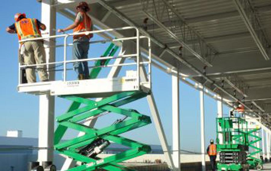 Electric scissor lifts.