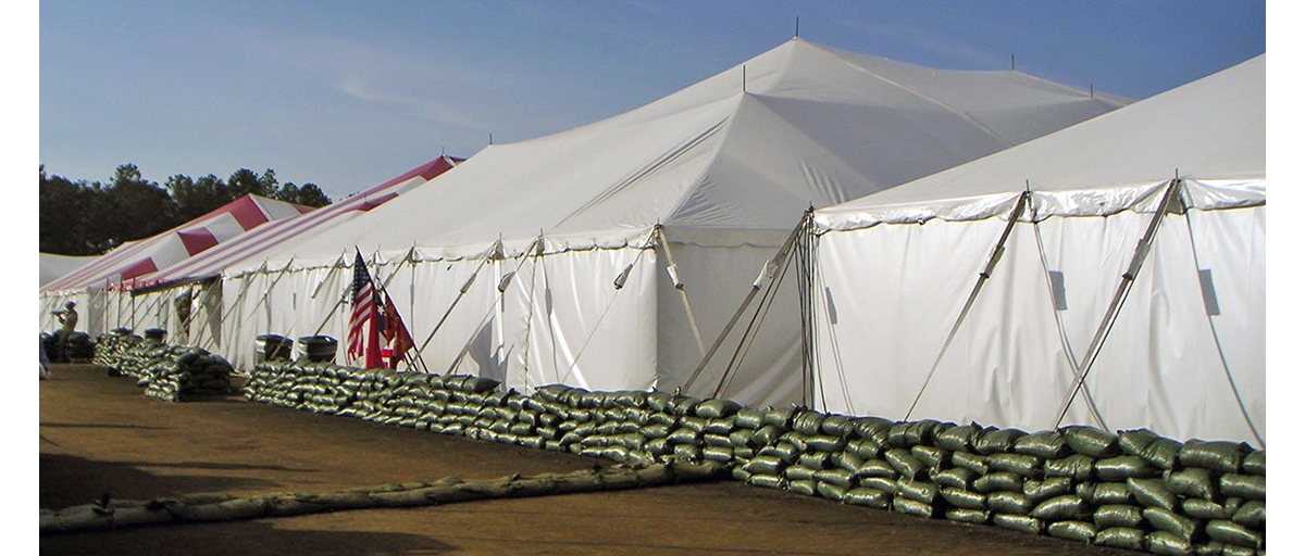 A temporary structure with an anchored building foundation.