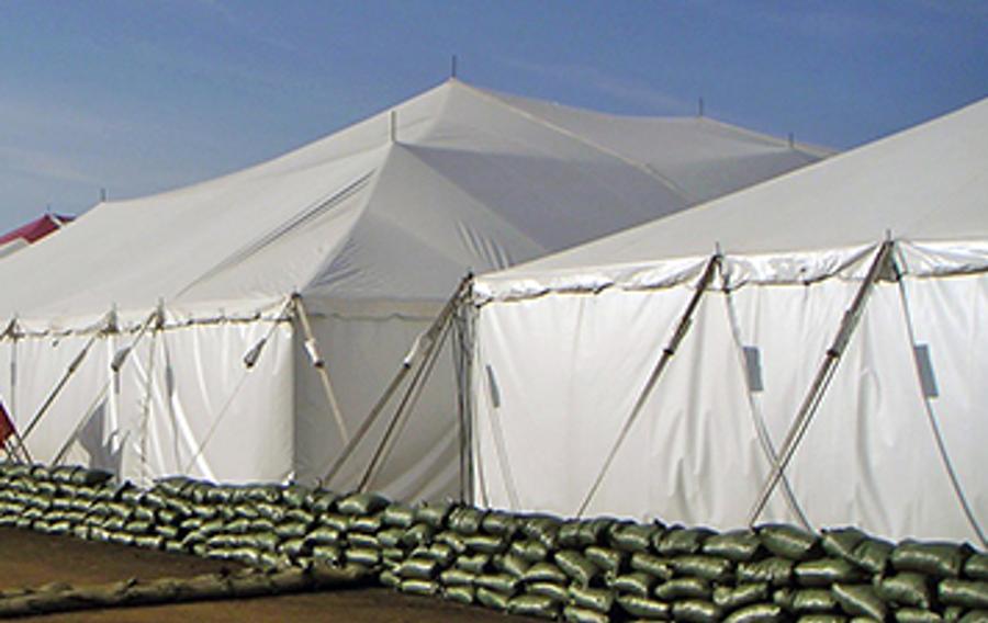 A temporary structure with an anchored building foundation.