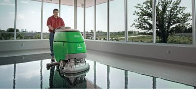 Someone polishing concrete flooring.