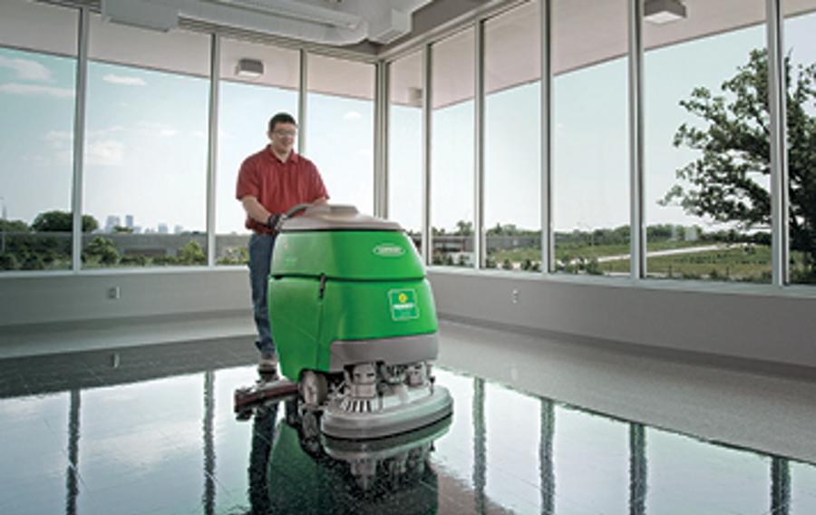 Someone polishing a concrete floor.