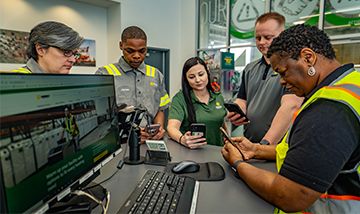 Sunbelt Rentals Team members assisting a customer