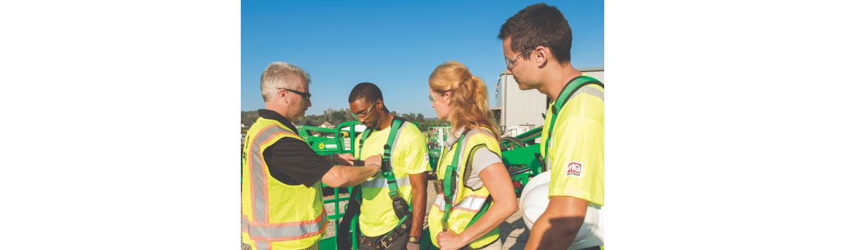 A group of sunbelt rentals working training on a jobsite. 