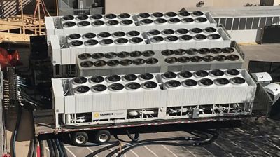 Rows of chillers from Sunbelt Rentals on trailers.