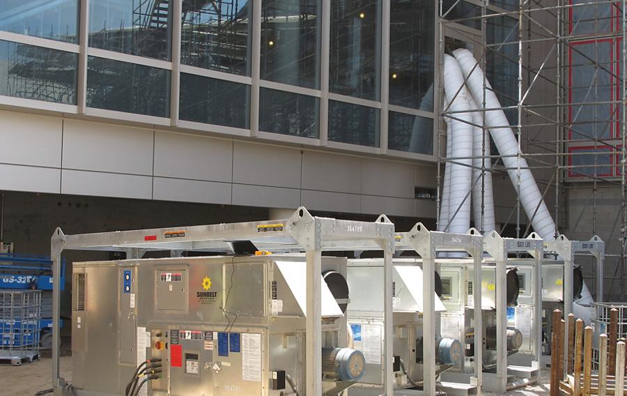 Desiccant dehumidifiers from Sunbelt Rentals installed at a job site.