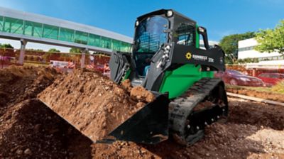 A dozer moving dirt at a job site.
