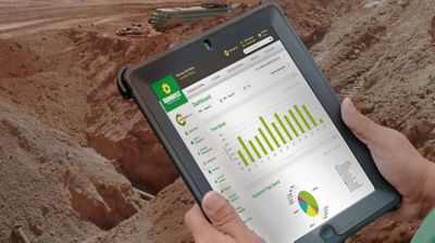 Jobsite manager using command center to track equipment performance. 