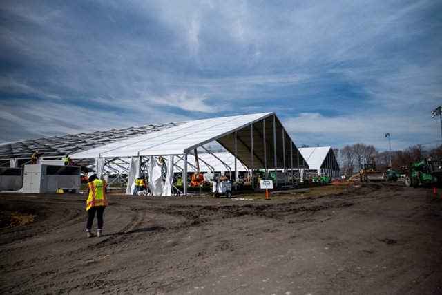 Temporary structures being built at an emergency response site.