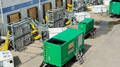 Emergency response equipment outside of a large building.