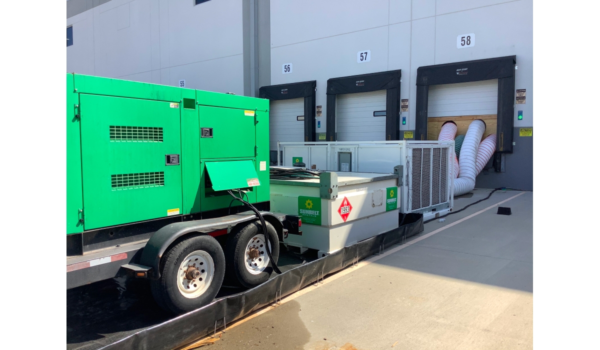 Material handling equipment outside of a sunbelt rentals warehouse.