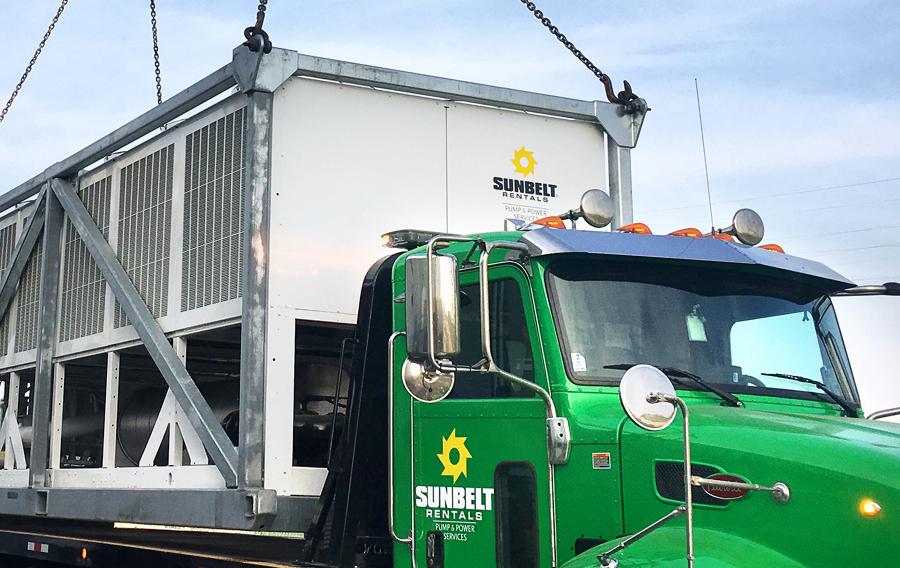 A Sunbelt Rentals truck carrying climate control equipment.