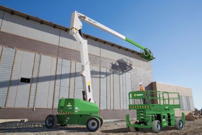 a JLG Articulating Lift and a Scissor Lift