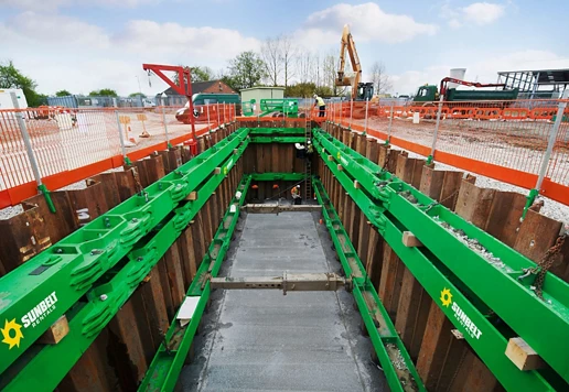 A sheet and frame system with safety fencing along the top.