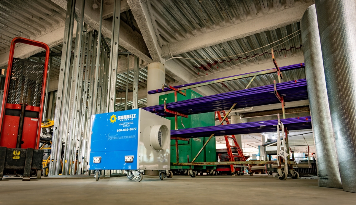 A portable air scrubber from Sunbelt Rentals in a facility.