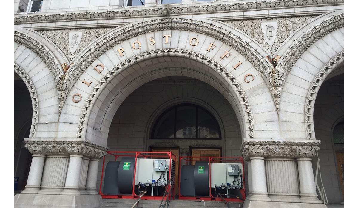 Emergency heating equipment, installed outside of a post office building.