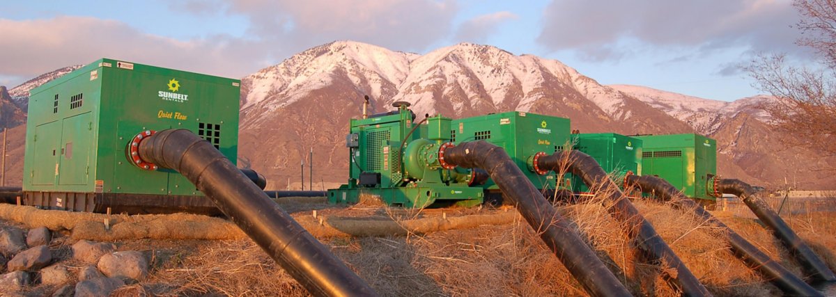 A row of Quiet Flow pumps from Sunbelt Rentals, in the mountains.