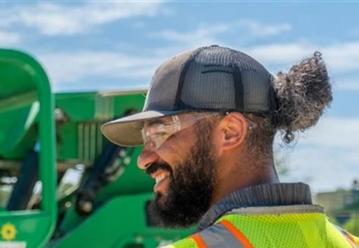 People wearing safety apparel at a job site.