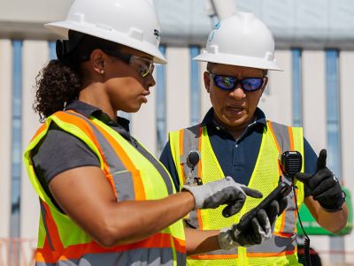 People reviewing generator test results.
