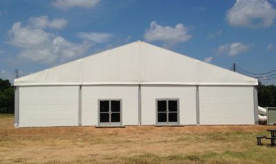 A temporary structure with two windows.