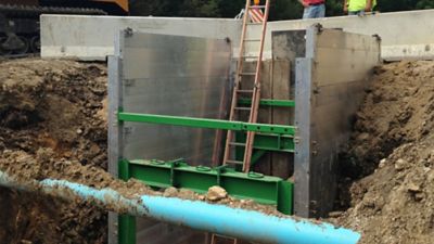 A trench box with a ladder inside.