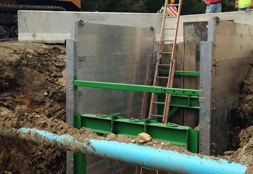 A trench box with a ladder inside.